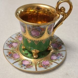 Gold and Green Porcelain Cup and Saucer Set